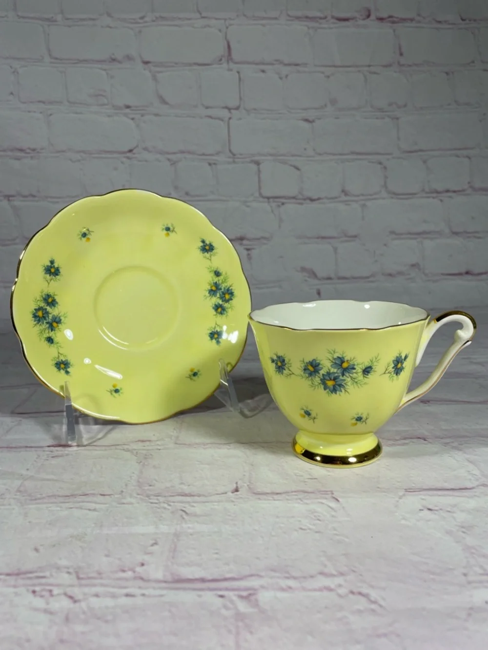 Vintage Yellow and Blue Floral Gold Trim Bone China Footed Teacup and Saucer Set